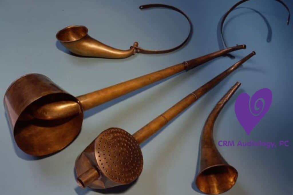several old ear trumpets