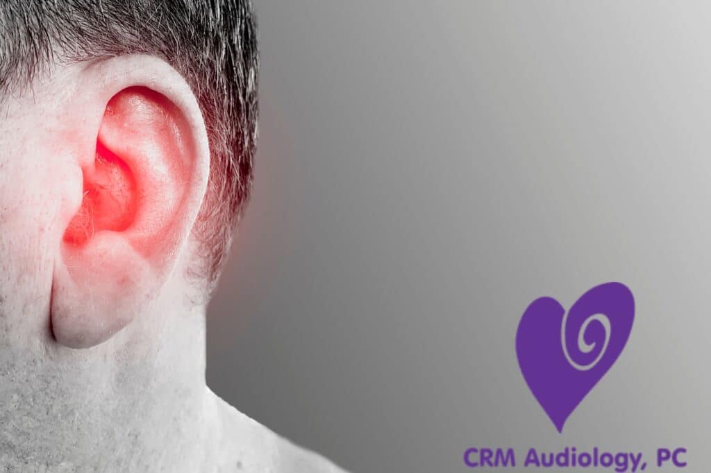 mans ear glowing red