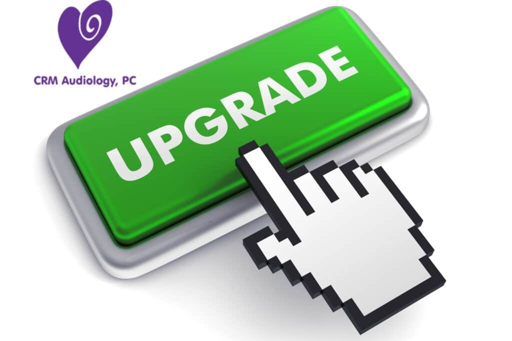 green upgrade button with a finger about to push it
