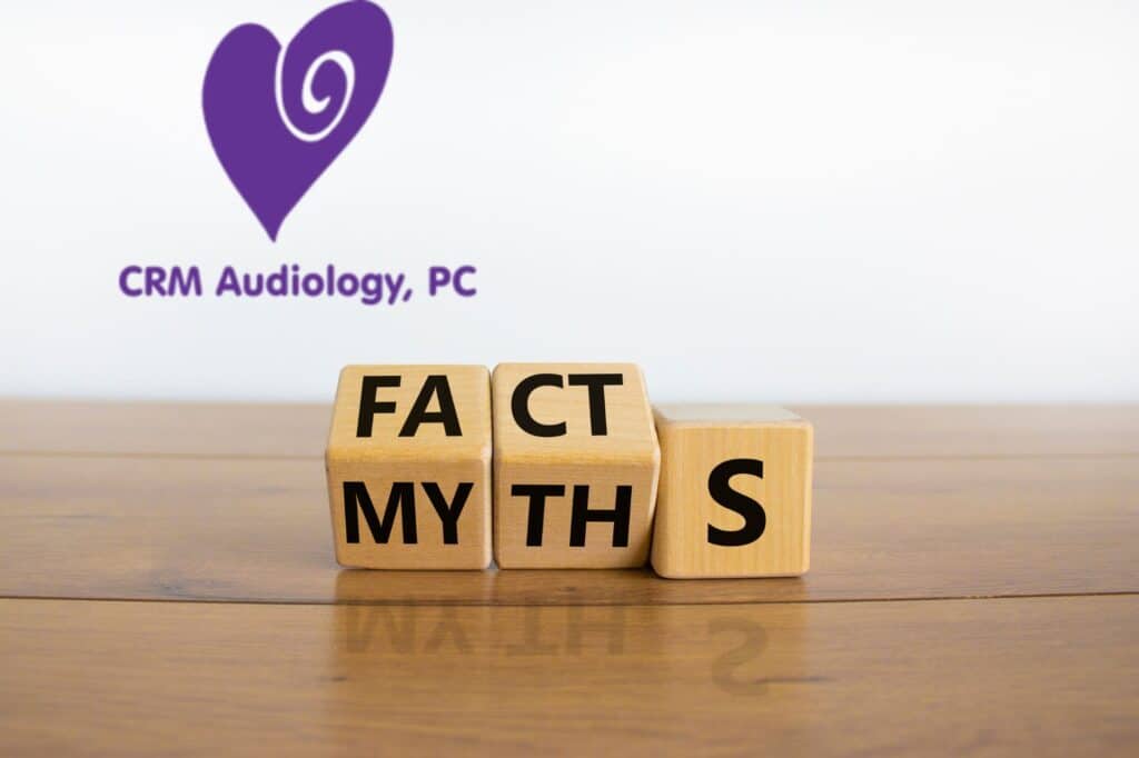 wooden blocks changing the word myths to the word facts