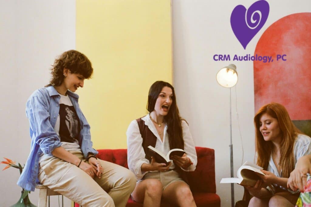 group of women reading and talking