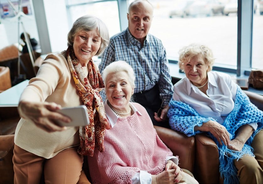 Group of older adults taking a selfie